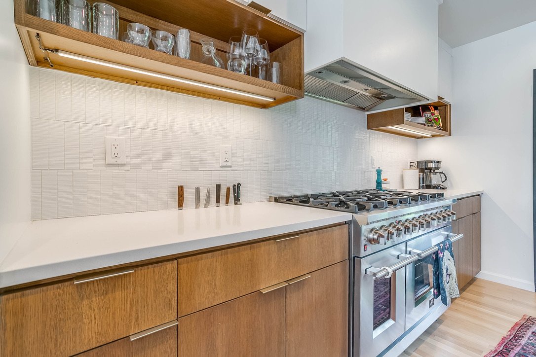 Kitchen counter with a high-end stove and range
